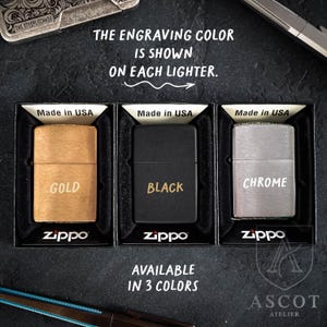 May include: Three Zippo lighters in gold, black, and chrome finishes, each displayed in a black box with the text Made in USA. The lighters feature the words GOLD, BLACK, and CHROME engraved on the front. Text reads: THE ENGRAVING COLOR IS SHOWN ON EACH LIGHTER. AVAILABLE IN 3 COLORS.