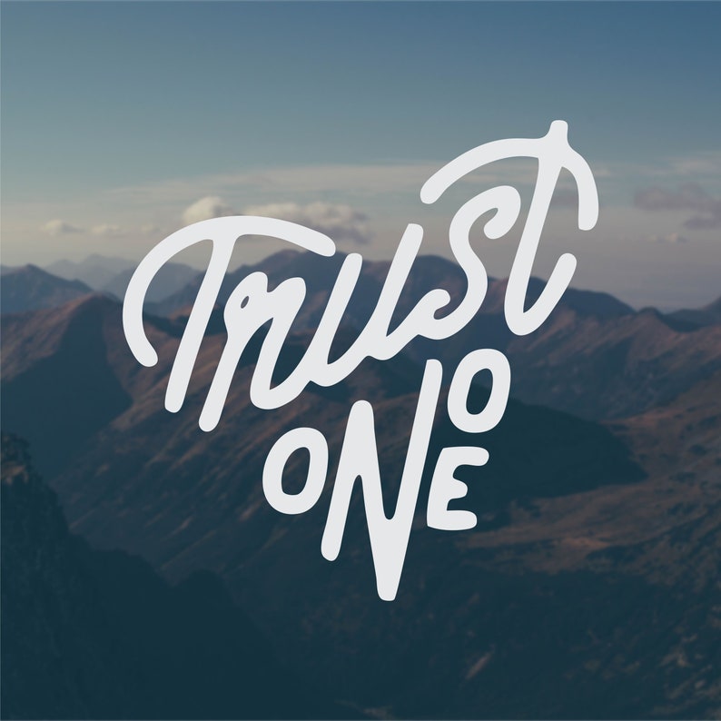 May include: White text on a blurred background of mountains reads "Trust no one".