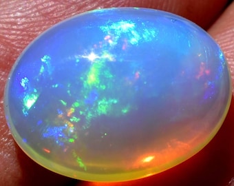2.75 Cts Size Brilliant Natural Ethiopian Opal pear Cabochon 9x13.5 MM