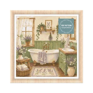 May include: A framed cross-stitch pattern showing a vintage bathroom scene. The room features a claw-foot tub, a green vanity, and a window. Lavender plants and floral accents add a touch of nature. The text "PDF PATTERN" is visible.