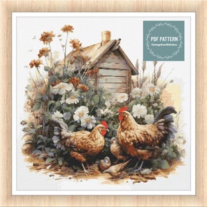 Può includere: Schema di punto croce con un pollaio in legno rustico con due galline marroni e un pulcino in un giardino con fiori bianchi. Il modello è intitolato "PDF Pattern CottageCrossStitches".