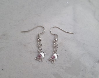 Silver bird earrings with pink diamonds