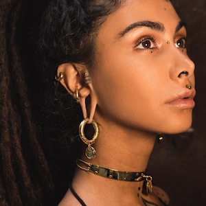 Tribal antique gold coin ear weights