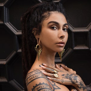 Gold statement tribal ear weights