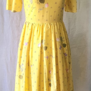 1970s yellow floral Swiss cotton dress.