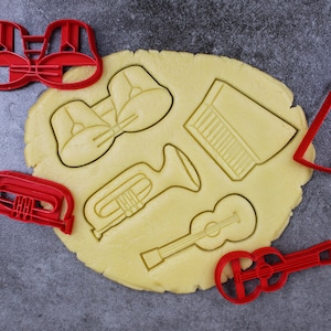 Music themed cookie cutters: Guitar, Trumpet, Piano, Drum