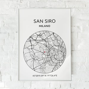 May include: A black and white map of San Siro, Milan, Italy, with a red dot marking the location of the stadium. The map is in a circular frame with the text "SAN SIRO MILANO" above the map and the coordinates "45°28'41.09"N 9°7'26.4"E" below the map.