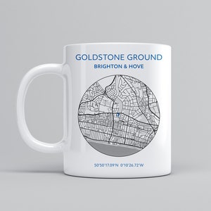 May include: White ceramic mug with a black and white map of Goldstone Ground, Brighton & Hove, England. The mug has the coordinates 50&deg;50'17.09"N 0&deg;10'26.72"W printed on the bottom.