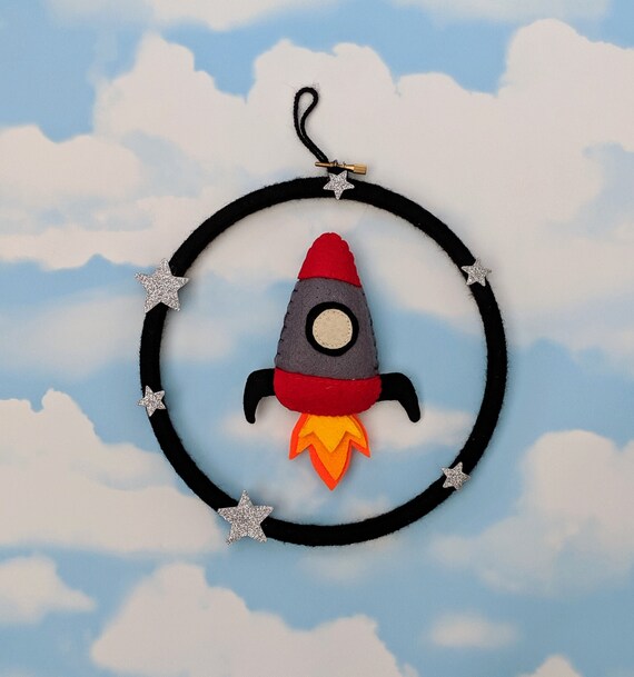 Handmade Felt Rocket Wall Hanging with Silver Sparkly Stars. Baby Boy Nursery Decor Gift. Handmade Felt Rocket Wall Hanging with Silver Sparkly Stars. Baby Boy Nursery Decor Gift.