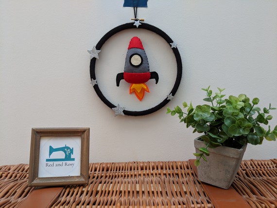 Handmade Felt Rocket Wall Hanging with Silver Sparkly Stars. Baby Boy Nursery Decor Gift. Handmade Felt Rocket Wall Hanging with Silver Sparkly Stars. Baby Boy Nursery Decor Gift.