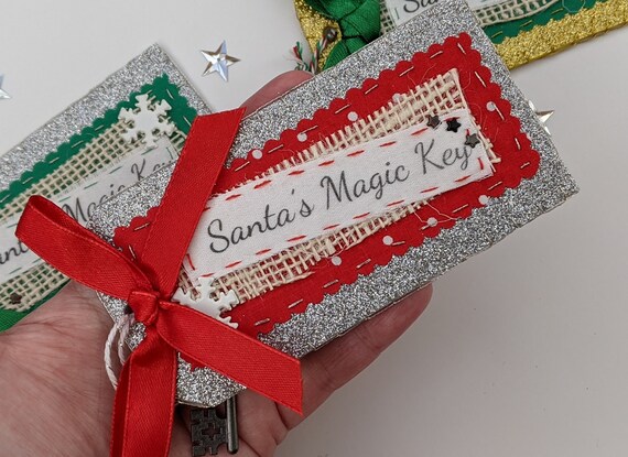 Santa's / Father Christmas's Magic Key with Tag. Christmas Family Heirloom. Fun Festive Tradition. Various Colours. Xmas Gift for kids. Santa's / Father Christmas's Magic Key with Tag. Christmas Family Heirloom. Fun Festive Tradition. Various Colours. Xmas Gift for kids.