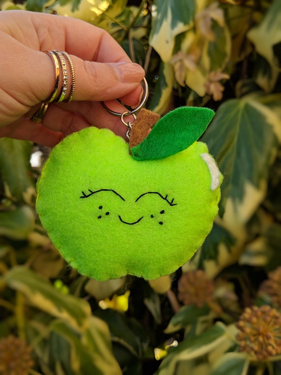 Cute Felt Kawaii Happy Smiling Apple Keychain / Keyring - Fun gift, cute stocking stuffer. Cute Felt Kawaii Happy Smiling Apple Keychain / Keyring - Fun gift, cute stocking stuffer.