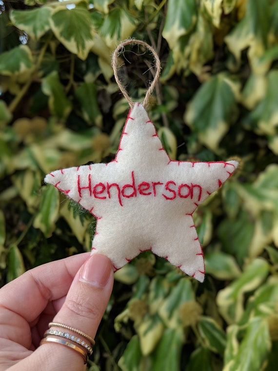 Personalised Scandinavian Style Felt Christmas Ornament, Red & Cream Star. Personalised Scandinavian Style Felt Christmas Ornament, Red & Cream Star.