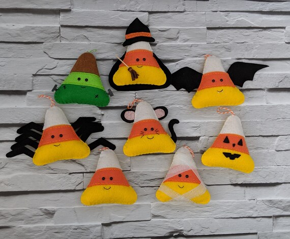 Halloween Candy Corn Decorations - Bundle of 8 including Cat, Bat, Spider, Mummy, Frankenstein's Monster, Mouse and Jack O Lantern. Halloween Candy Corn Decorations - Bundle of 8 including Cat, Bat, Spider, Mummy, Frankenstein's Monster, Mouse and Jack O Lantern.