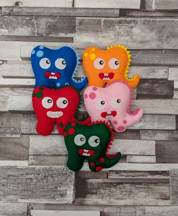 Personalised Dinosaur Tooth Pillow, Handmade with Money and Tooth Pouch. Personalised Dinosaur Tooth Pillow, Handmade with Money and Tooth Pouch.