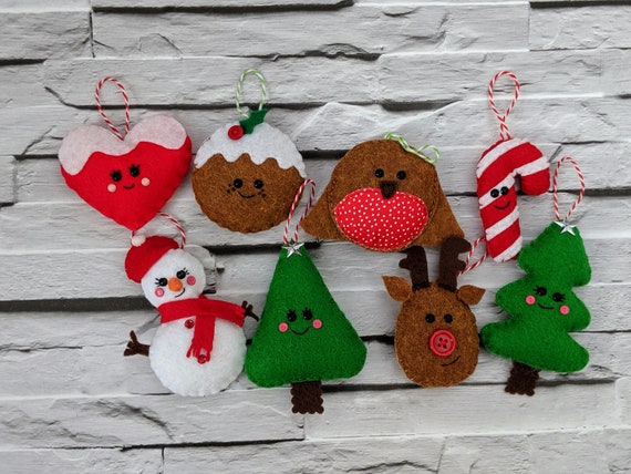 Cute Christmas Ornaments, 8 pack containing Snowman, Christmas Tree, Reindeer, Robin, Candy Cane, Festive Heart and Robin. Cute Christmas Ornaments, 8 pack containing Snowman, Christmas Tree, Reindeer, Robin, Candy Cane, Festive Heart and Robin.