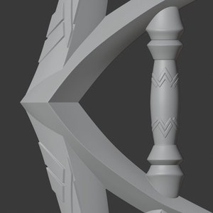K&ouml;nnte beinhalten: Ein graues, 3D-gedrucktes Modell einer Waffe mit einem Griff und einer scharfen Spitze. Der Griff hat ein dekoratives Muster.