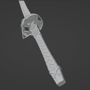 May include: A grey 3D digital model of a sword featuring a long handle with a diamond-patterned wrap, a decorative circular guard with intricate cutouts, and a partial blade extending from the top of the hilt in a neutral light grey tone.