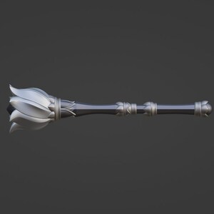 May include: A silver and black ceremonial mace with a decorative flower-shaped head and a long, slender handle.