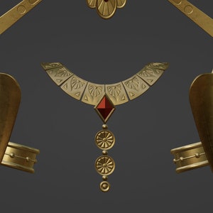 May include: A gold-toned jewelry set consisting of a wide collar necklace with a central red diamond-shaped stone and three dangling circular pendants, two matching arm cuffs, and a curved headpiece with a central floral element.
