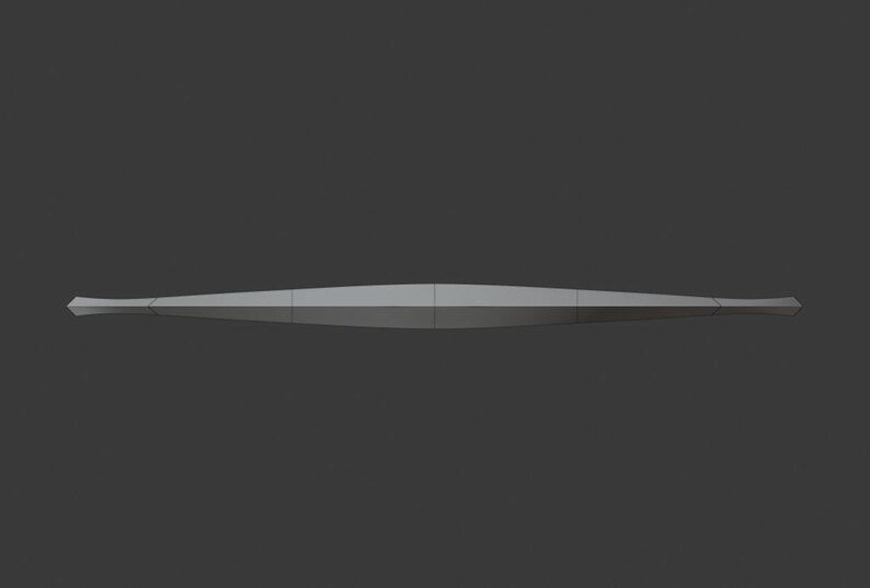 May include: A long, thin, silver-colored metal rod with a pointed tip at each end.