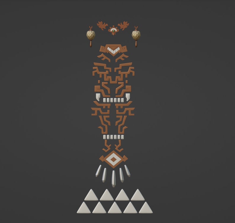 May include: A collection of brown and white geometric decorative elements arranged vertically. The set includes two hanging ornaments, a central mask-like pattern with white teeth, a diamond shape, four pointed spikes, and six white triangles.