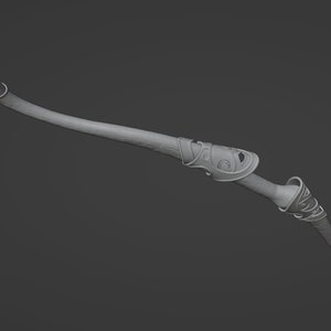 May include: A gray, curved bow with intricate details and a decorative design. The bow is made of a smooth, textured material.
