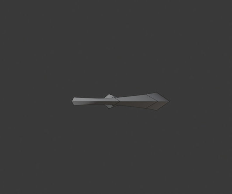 May include: A silver-colored metal arrowhead pendant with a pointed tip and a flat back.