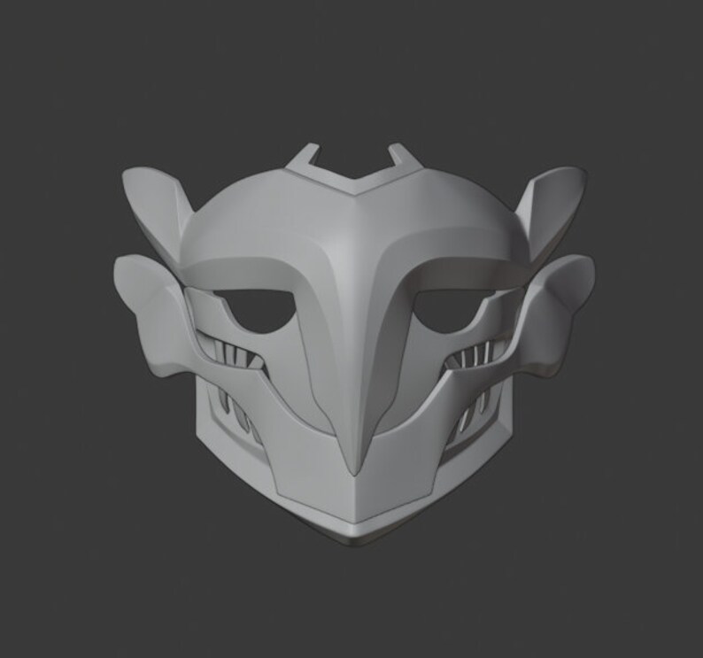 May include: A gray 3D printed mask with a sharp, angular design. The mask has two eye holes and a pointed beak.
