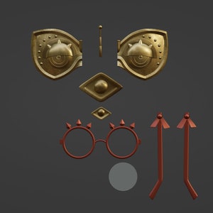 Op de afbeelding: Een set gouden oogvormige decoratieve stukken, een paar rode brillen met spikes en twee rode pijlvormige stukken.