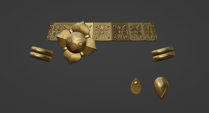 May include: A gold-colored jewelry set consisting of a wide choker necklace with a central flower-shaped medallion and repeating sunburst patterns, two matching double-band bracelets, and two distinct teardrop-shaped pendant charms.