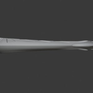 May include: A grey, elongated object with a rounded end and a pointed tip. The object has a series of parallel grooves along its length. It appears to be made of a solid material. The design is simple and modern.