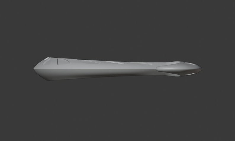 May include: A grey, elongated object with a rounded end and a pointed tip. The object has a series of parallel grooves along its length. It appears to be made of a solid material. The design is simple and modern.