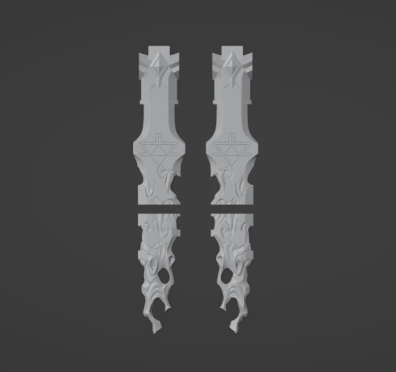 May include: Two 3D printed gray plastic pieces with a detailed design. The pieces are shaped like a long, thin, pointed blade with a decorative pattern.