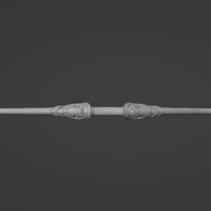 May include: A silver-colored, decorative, double-ended staff with intricate carvings on each end.