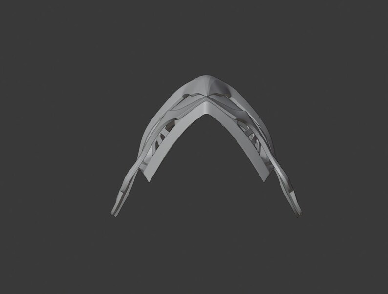 May include: A 3D printed model of a helmet with a geometric design. The helmet is made of a light gray plastic and has a pointed top.