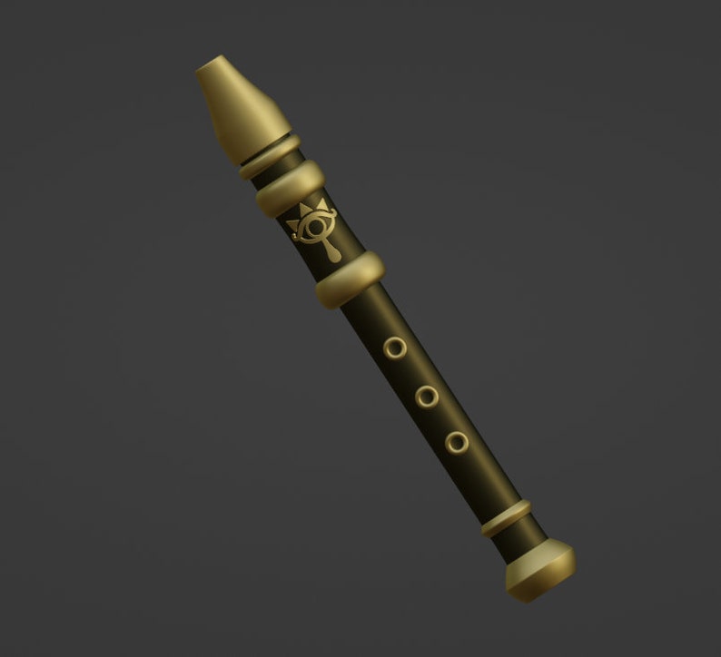 May include: A gold and black flute with a stylized eye design. The flute has six holes and a gold mouthpiece.