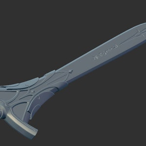 May include: A silver sword with intricate details on the hilt and blade. The blade is engraved with the text "The Sword of Truth".