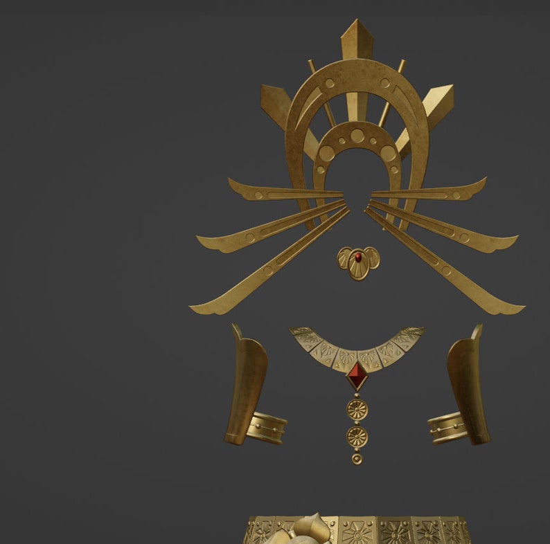 May include: A gold-colored costume set featuring a large arched headpiece with radiating spikes, a small circular emblem with a red center, a necklace with a red diamond-shaped pendant and dangling discs, two arm cuffs, and a wide base piece.