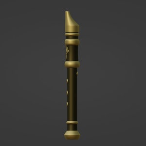 May include: A black and gold wooden flute with decorative details. The flute has a gold mouthpiece and a gold band around the bottom.