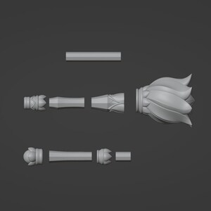 May include: A 3D printed model of a decorative flower-shaped scepter, disassembled into five pieces. The pieces include a top, two middle sections, and a bottom.