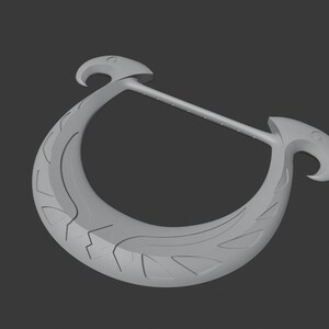 May include: A light grey, crescent-shaped object with a straight handle. The curved section has etched designs, and the ends have bird-like shapes. The object is set against a dark grey background.