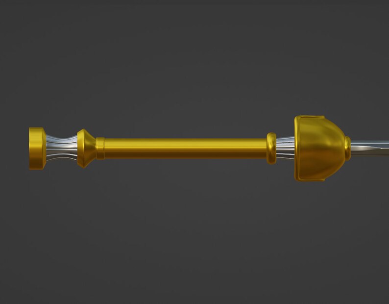 May include: A gold curtain rod with decorative finials. The rod is made of metal and has a polished finish.