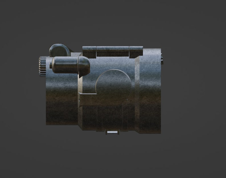 May include: A black metal scope with a textured finish. The scope has a small, round window on the side and a small, black knob on the top.