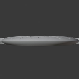 May include: A grey, oval object with a ridged top and rounded edges. The object appears to be made of a solid material and is set against a grey background. The design suggests a possible kitchen or dining item.