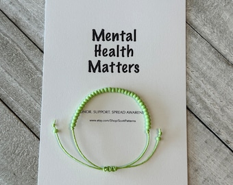 Pulsera de cuentas verde lima para concienciar sobre la salud mental
