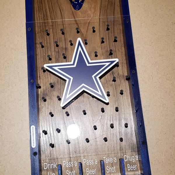 Dallas Cowboys Drinko plinko wall mounted bottle opener.