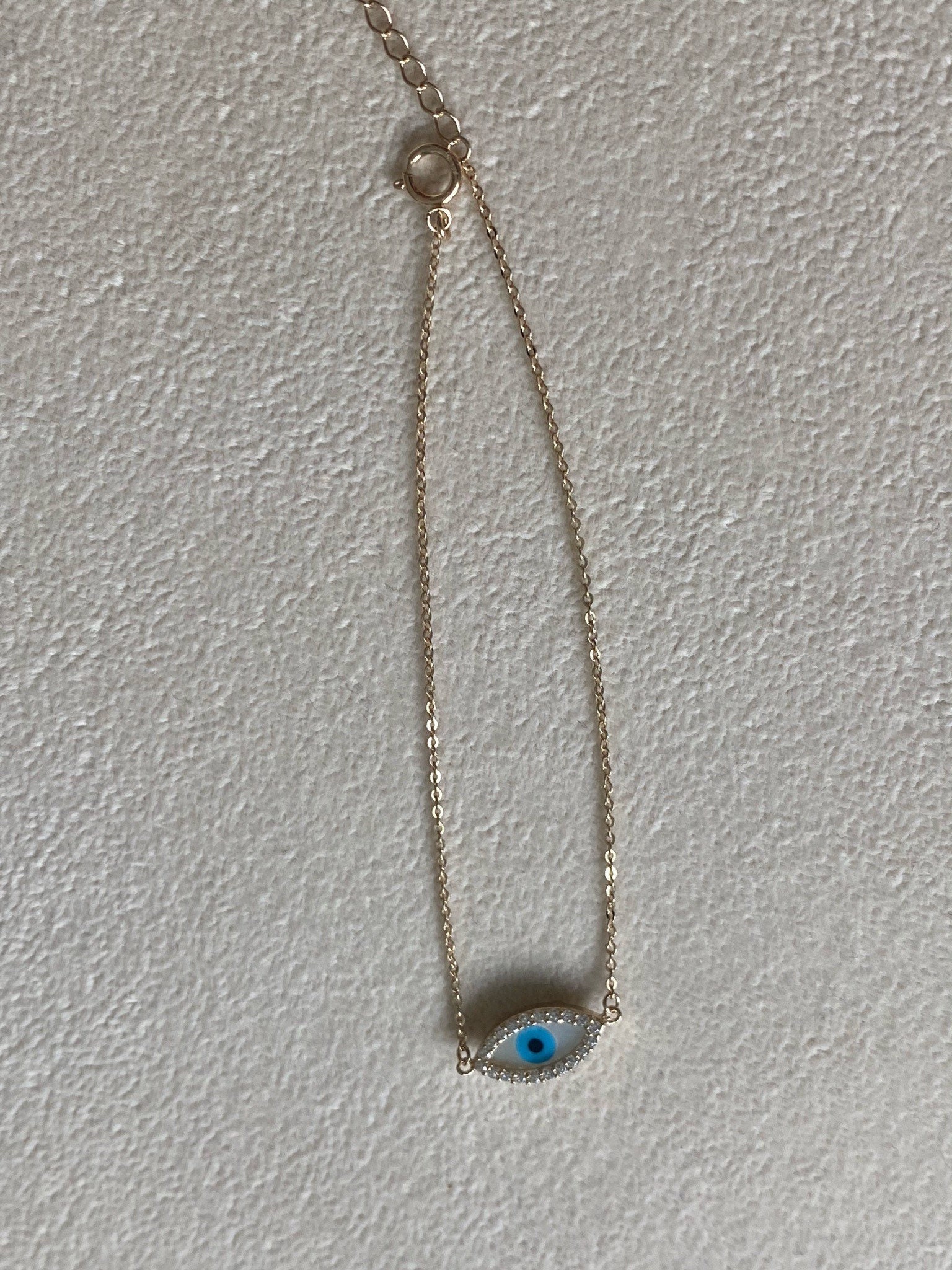 solid gold evil eye bracelet