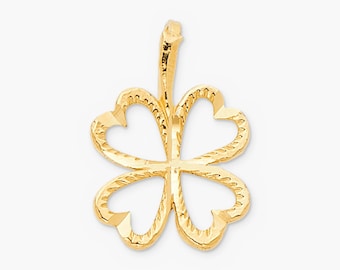 May include: A gold-toned four-leaf clover pendant featuring a textured, diamond-cut finish along the edges of the leaves. The charm has an open-work design with a small, vertical bail at the top for attachment to a chain or necklace.