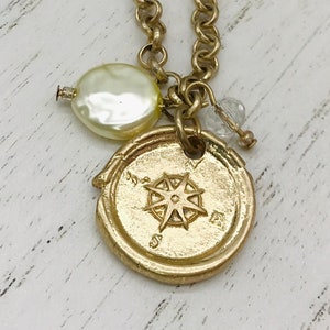 Vintage Necklace Gold Toned With Compass Design Dangle Faux Pearl And Clear Faceted Bead by Megan Browne 18&quot;-21&quot;  length